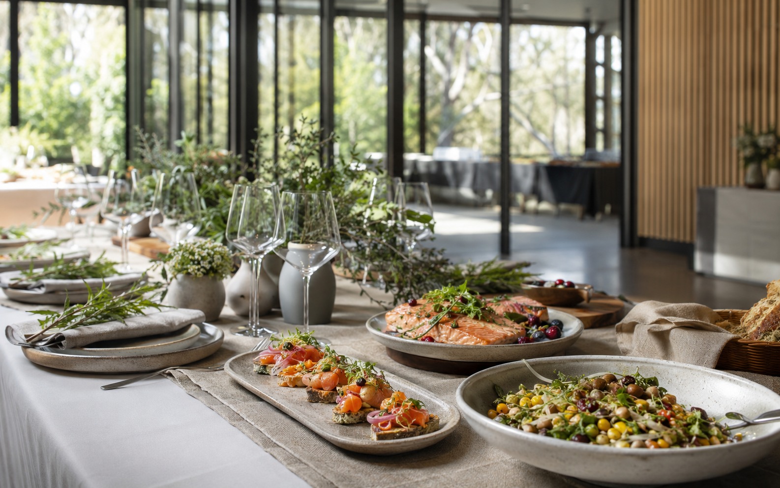 Elegant Riverstone catering table with refined canapés and event presentation